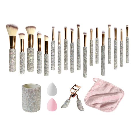 Glitz and glam brush set - Shop jenromero123's closet or find the perfect look from millions of stylists. Fast shipping and buyer protection. -all over bedazzled rhinestone set -Includes: -21 brushes -2 makeup sponges -1 storage cup -1 eyelash curler -1 facial headband -4 dent free hair clips -heartstopper brush set -comes in pink glitter box -all new never taken out of box. No …